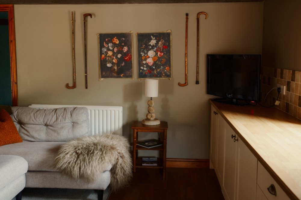 A comfortable cottage sitting room at Patty’s Barn