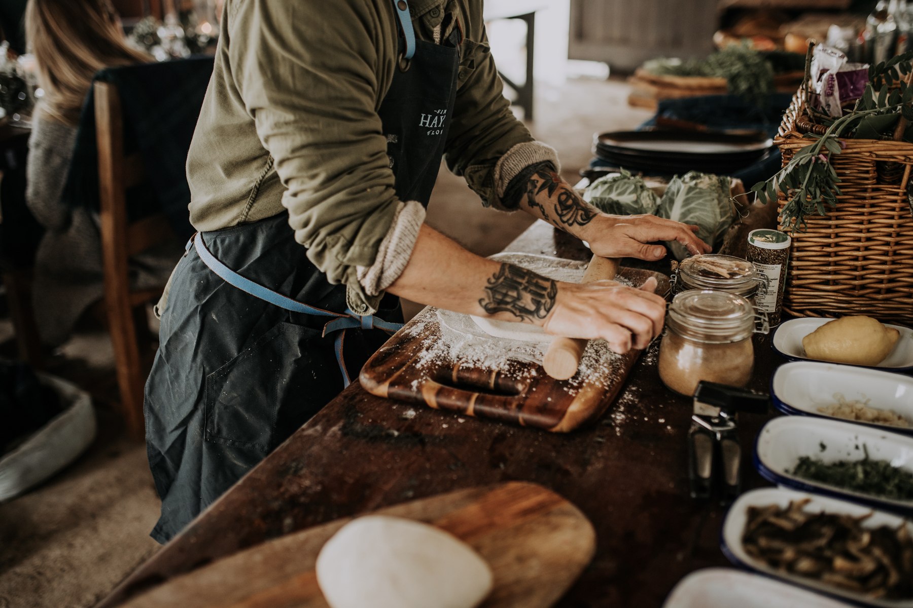 Rolling dough during a Land + Sea food experience